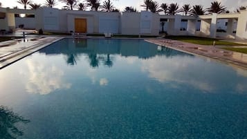Outdoor pool, pool umbrellas, pool loungers
