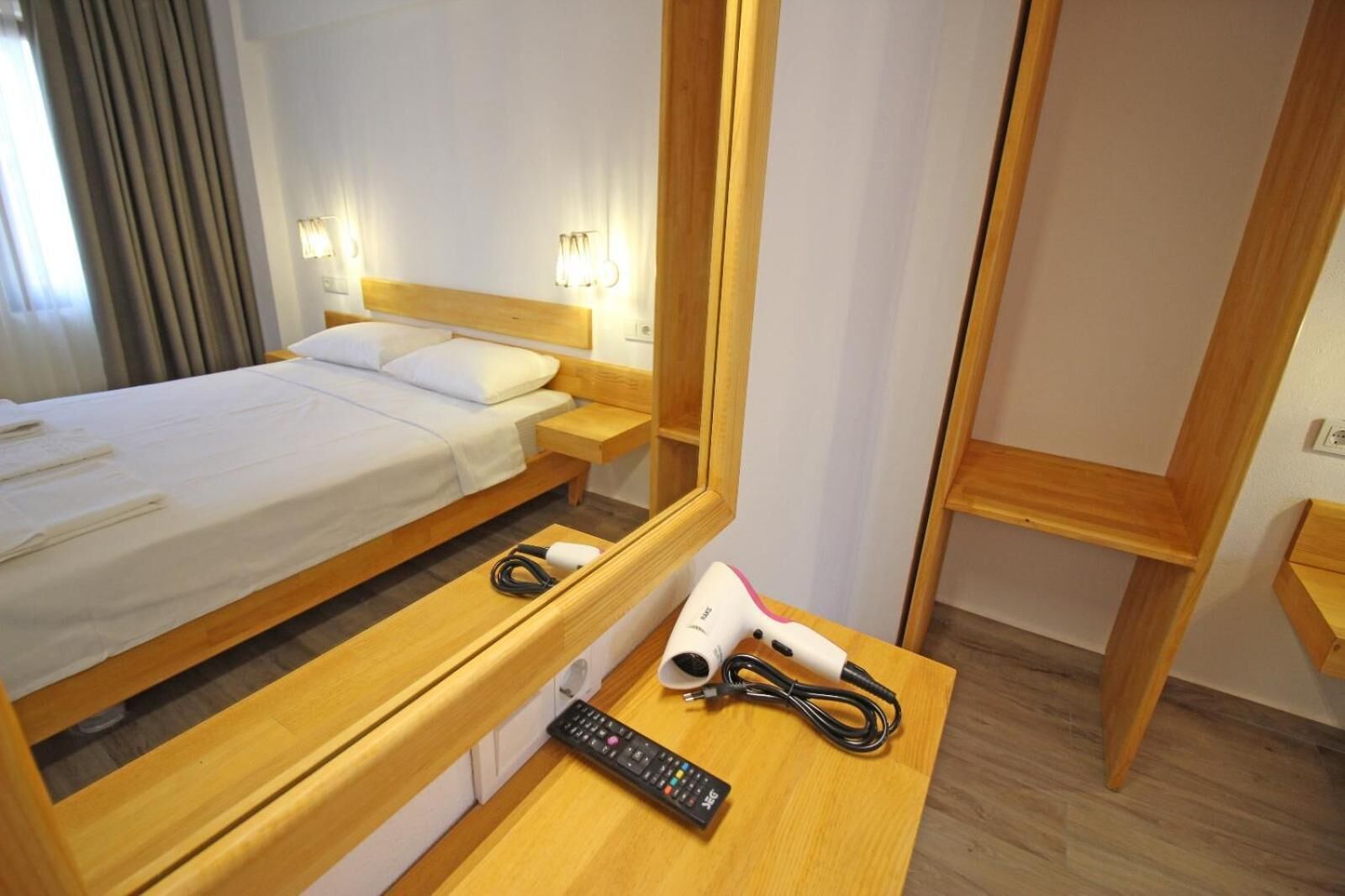 minibar, blackout curtains, soundproofing, rollaway beds