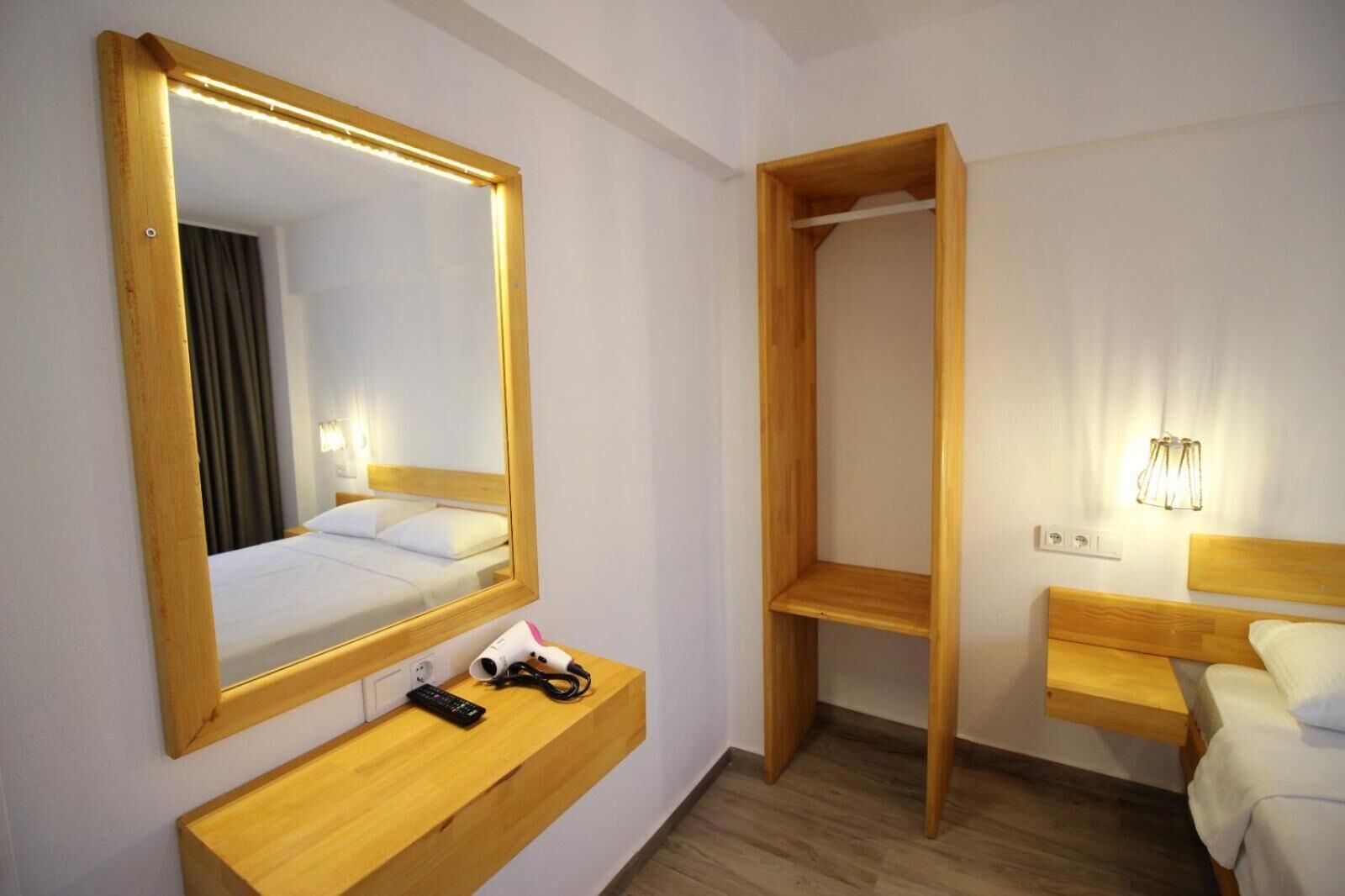 minibar, blackout curtains, soundproofing, rollaway beds