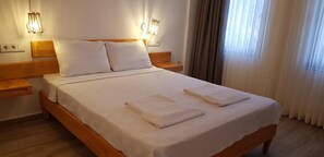 Minibar, blendingsgardiner, lydisolert og ekstrasenger (mot et tillegg)