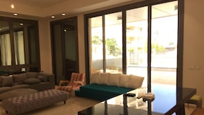Appartement, 3 chambres | Coin séjour