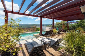 Outdoor pool, open 9:00 AM to 10:00 PM, pool umbrellas, sun loungers