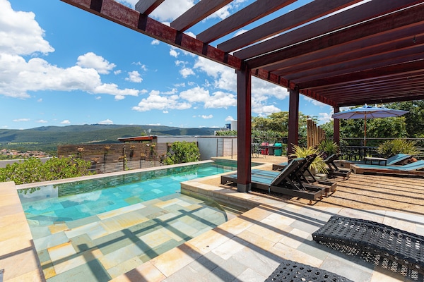Outdoor pool, open 9:00 AM to 10:00 PM, pool umbrellas, sun loungers