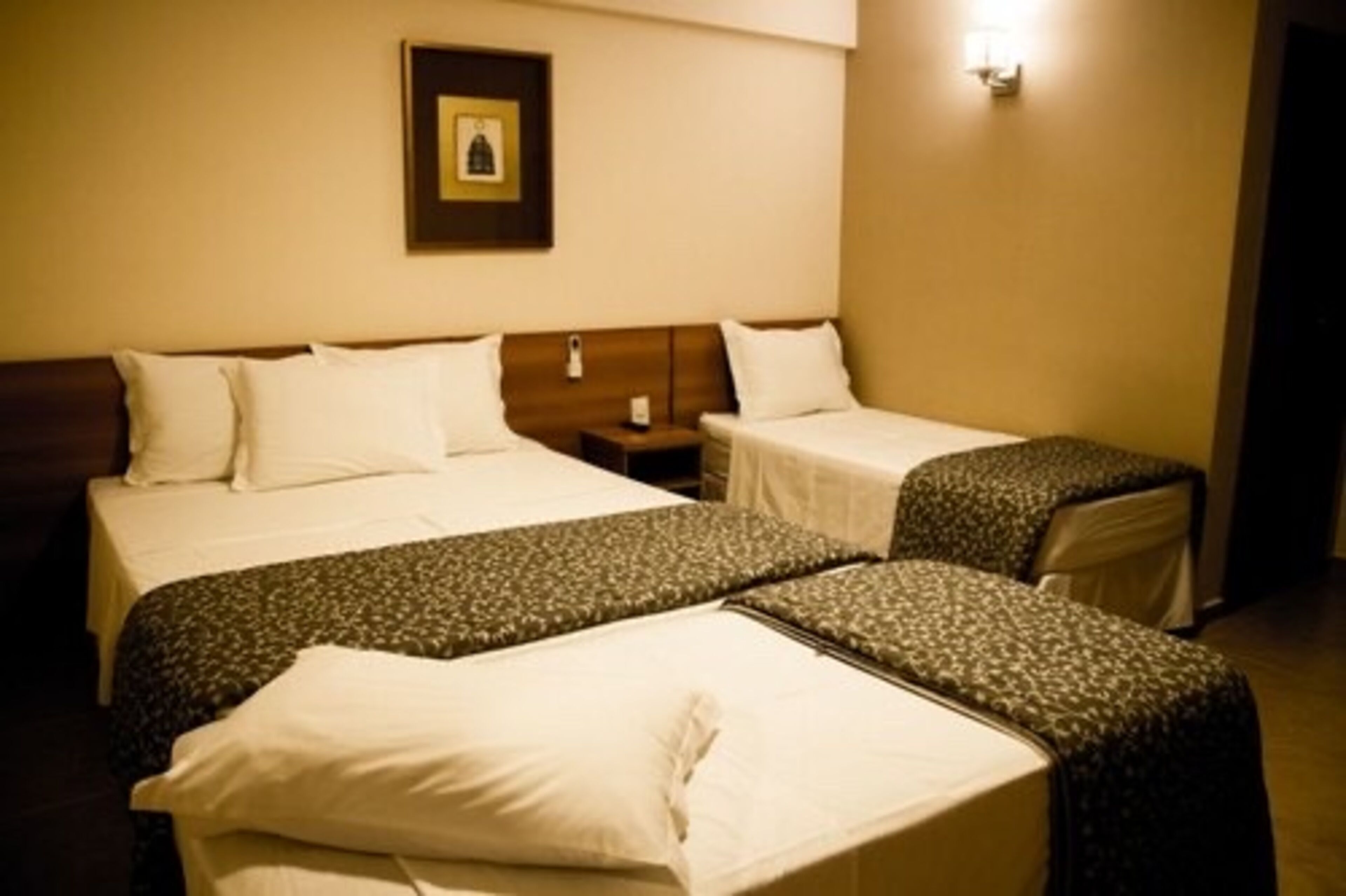 deluxe quadruple room | hypo-allergenic bedding, minibar, in-room safe, desk