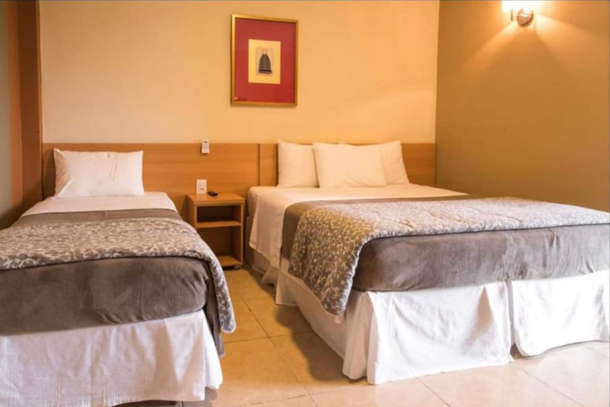 deluxe triple room | hypo-allergenic bedding, minibar, in-room safe, desk