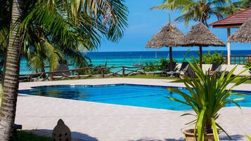 Outdoor pool, pool umbrellas, pool loungers