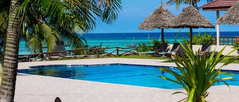 Outdoor pool, pool umbrellas, pool loungers