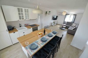 Apartment, Multiple Beds, Sea View | Private kitchen | Full-size fridge, oven, stovetop, dishwasher - Apartments Enida (Tisno)