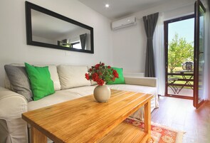 コンフォート アパートメント テラス | リビング エリ  ア | スマートテレビ、Netflix