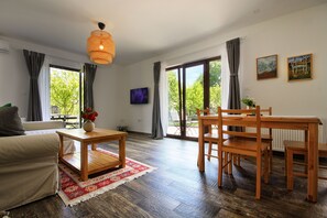 Apartamento conforto, terraço | Área de estar | Smart TV, Netflix