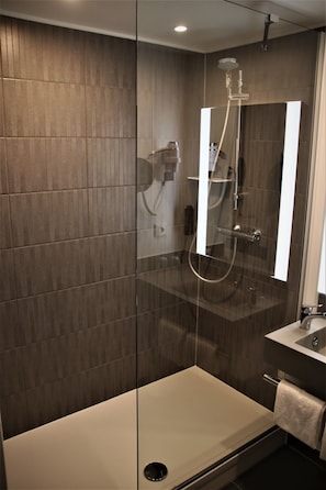 Shower, eco-friendly toiletries, hair dryer, towels