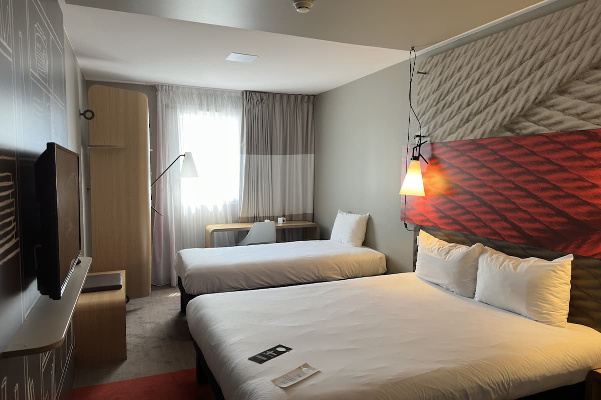 triple room, multiple beds | premium bedding, pillow-top beds, individually furnished, desk