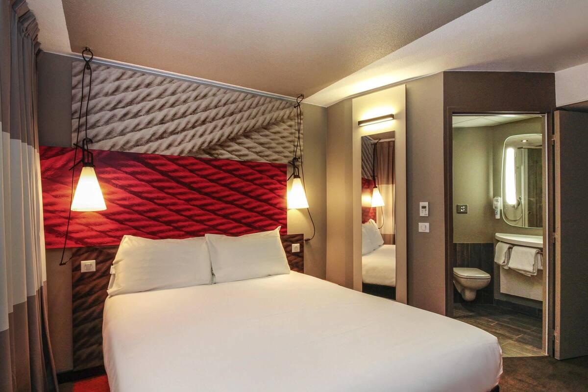 Premium bedding, pillow-top beds, desk, laptop workspace