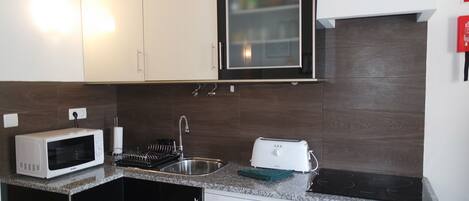 Apartment, 3 Bedrooms, Terrace | Private kitchenette | Full-size fridge, microwave, stovetop, coffee/tea maker