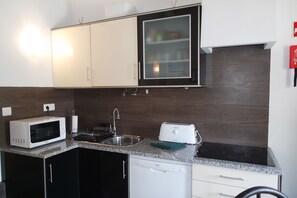 Apartment, 3 Bedrooms, Terrace | Private kitchenette | Full-sized fridge, microwave, stovetop, coffee/tea maker