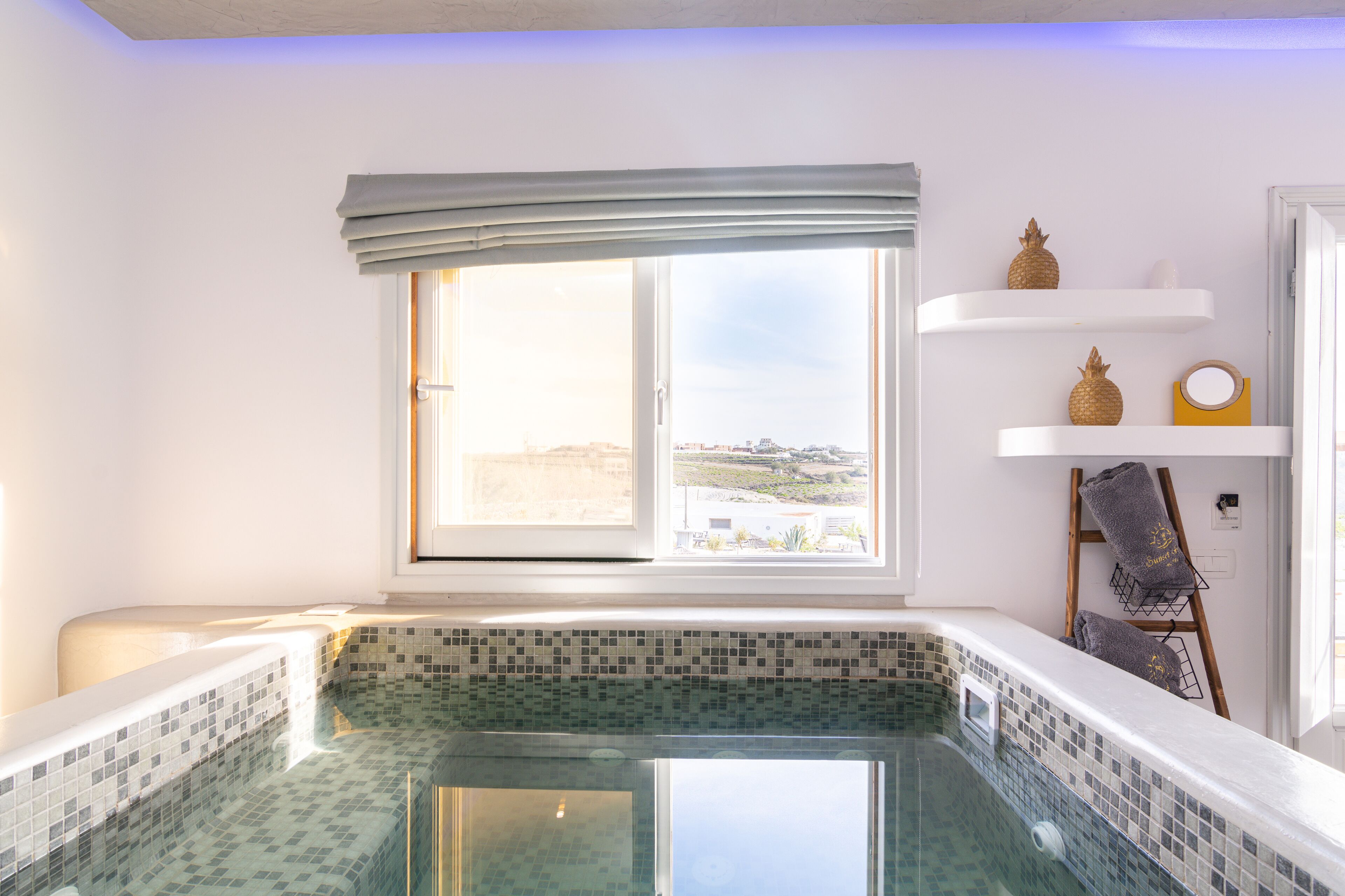 elegant suite with indoor jetted tub and sea view | 1 bedroom, in-room safe, individually decorated, individually furnished