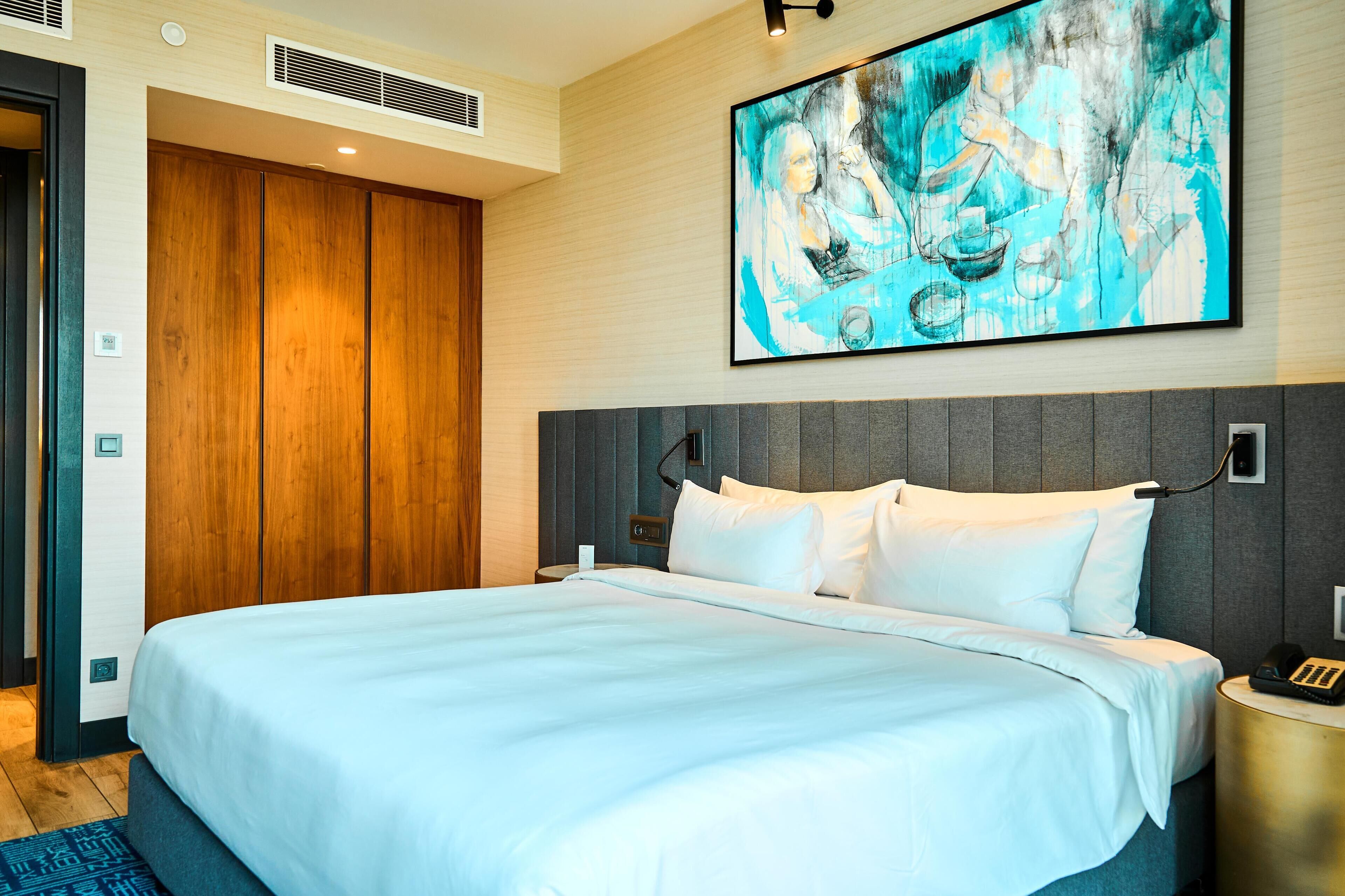 ルーム 1 ベッドルーム 簡易キッチン | 1 室のベッドルーム、羽毛の掛け布団、低反発ベッド、ミニバー