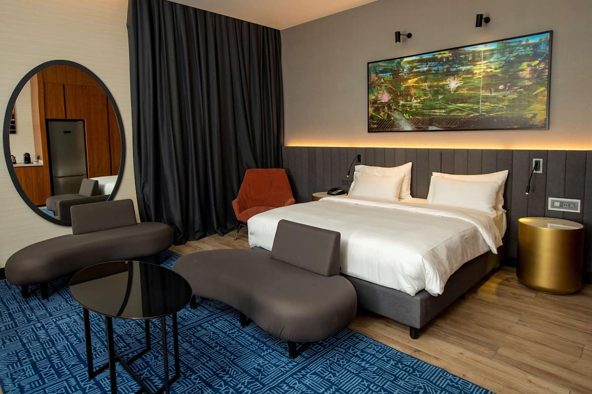 Junior Suite | 1 bedroom, down comforters, memory foam beds, minibar