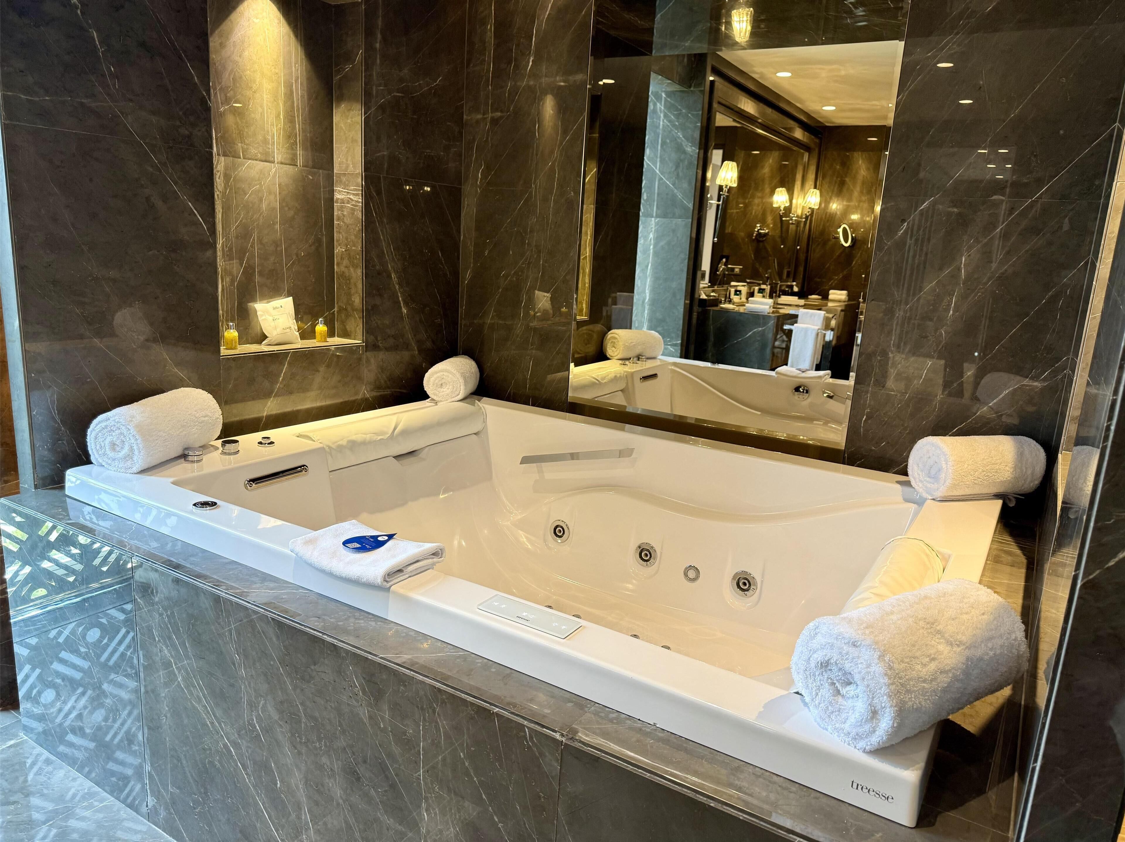 free toiletries, hair dryer, slippers, bidet