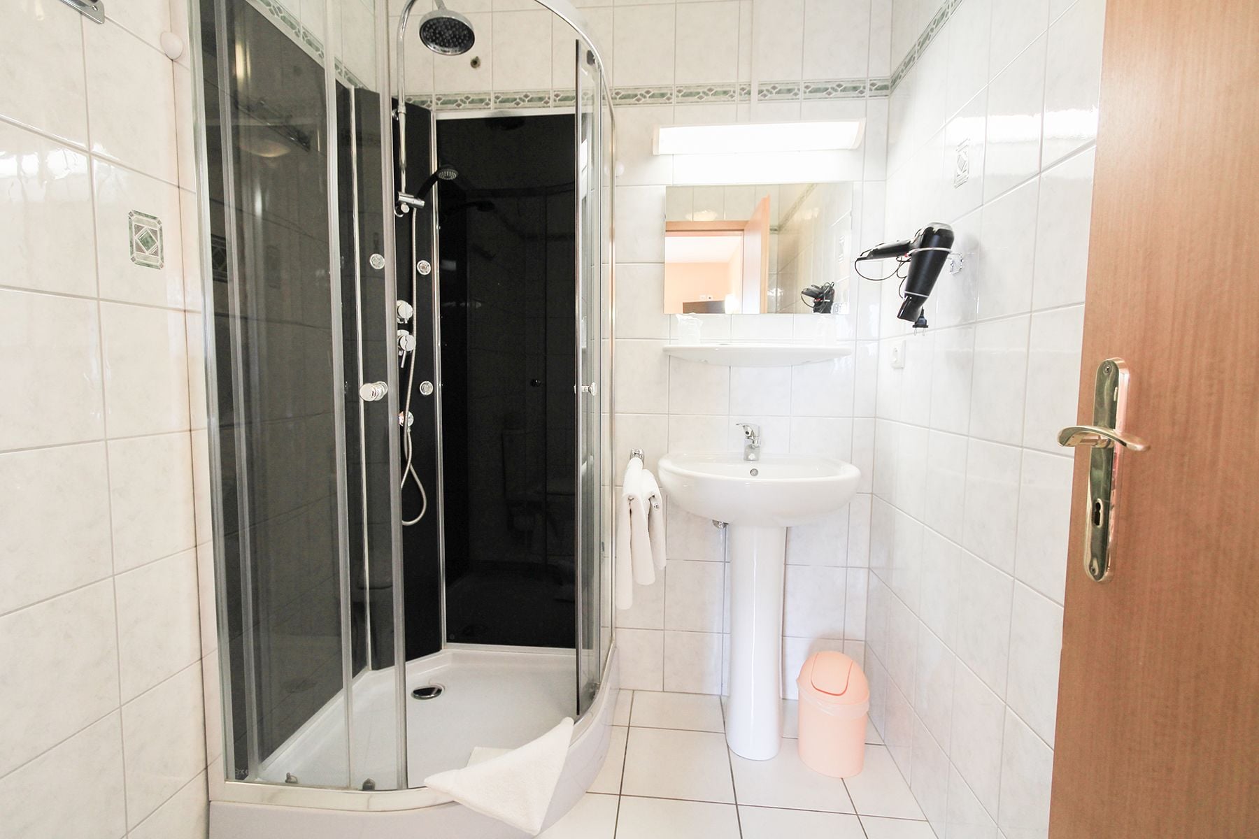 quadruple room, multiple beds | bathroom | free toiletries, hair dryer, towels
