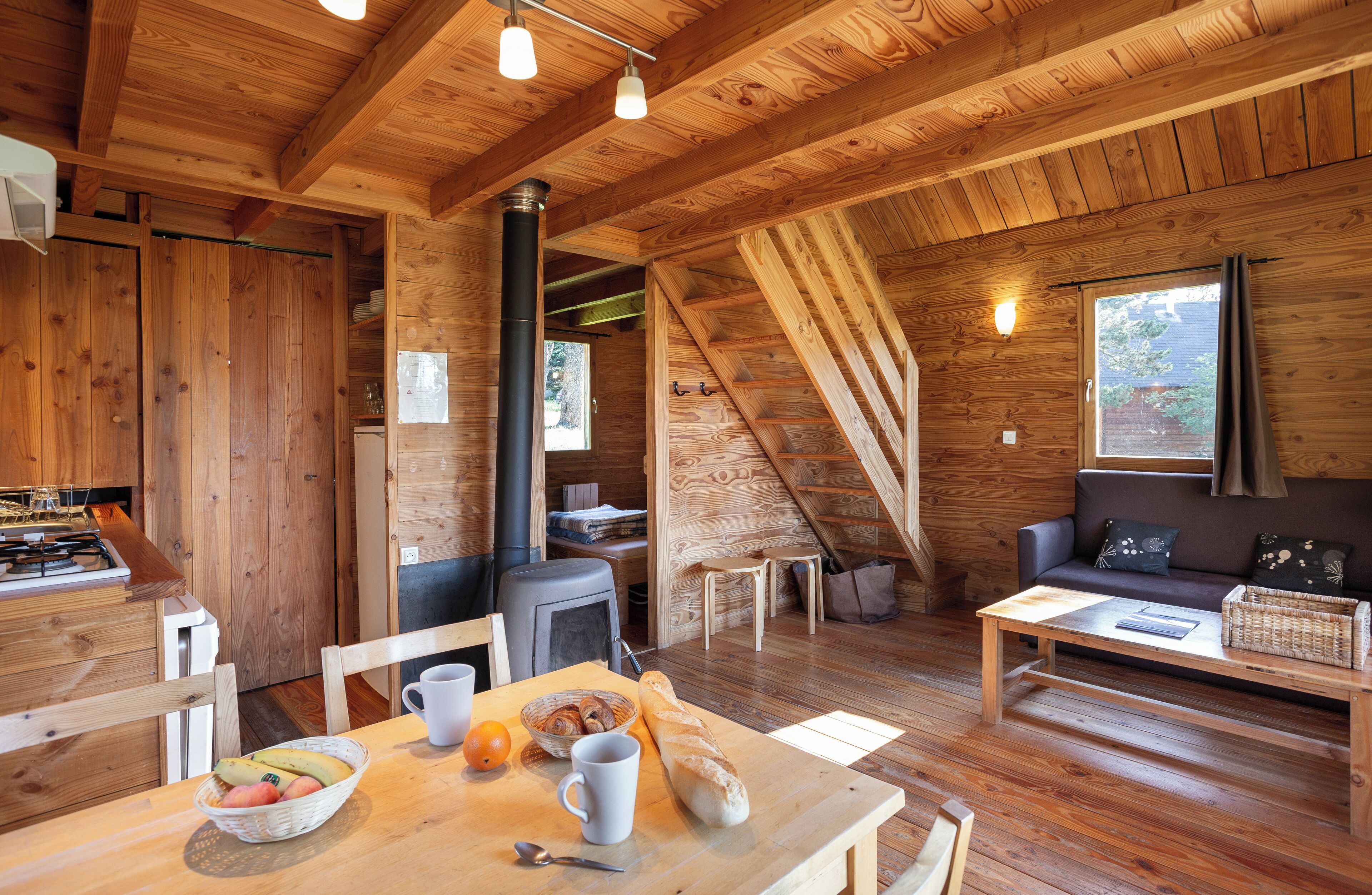 Deluxe chalet | Woonruimte | Tafelvoetbal en een tafeltennistafel