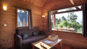 Deluxe Chalet | Living area | Foosball, table tennis