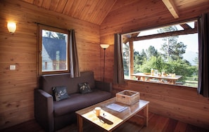Deluxe-Chalet | Wohnbereich | Tischfußball, Tischtennisplatte