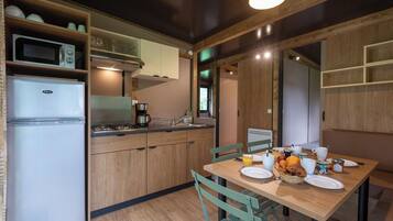 Family Chalet | Private kitchen | Stovetop, highchair, cookware/dishes/utensils, cleaning supplies