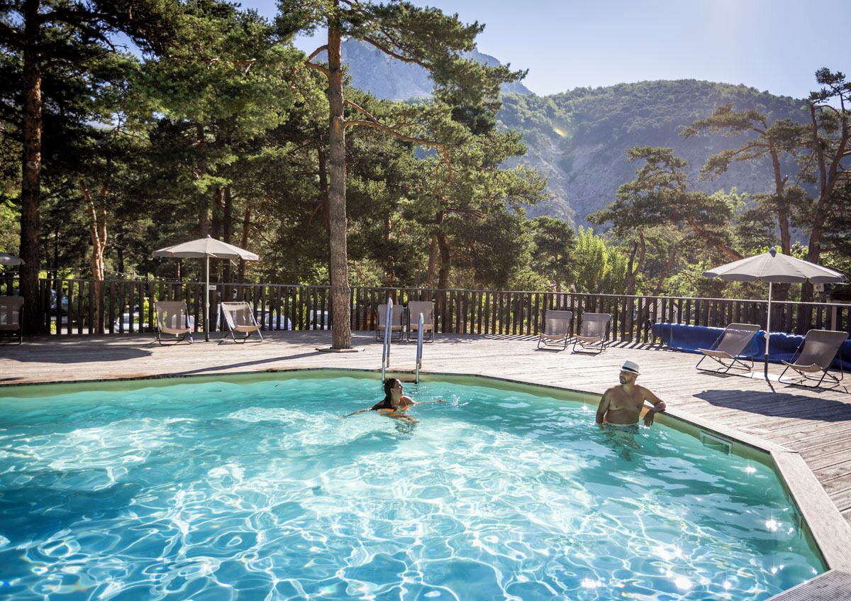 Seasonal outdoor pool, a heated pool, pool umbrellas, sun loungers