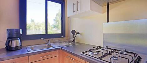 Mobile Home, 2 Bedrooms, Non Smoking | Private kitchen | Stovetop, highchair, cookware/dishes/utensils, cleaning supplies