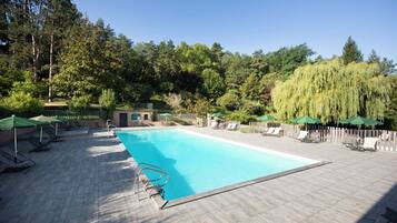 Indoor pool, seasonal outdoor pool, pool umbrellas, sun loungers