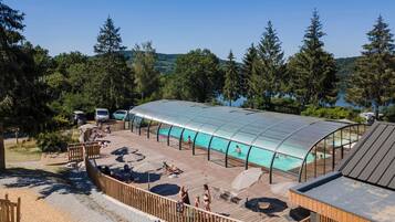 Indoor pool, open 9:00 AM to 6:00 PM, pool umbrellas, pool loungers