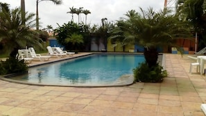Outdoor pool, pool umbrellas, pool loungers