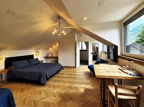 Deluxe-værelse til 3 personer | Dundyner, minibar, mørklægningsgardiner, gratis Wi-Fi