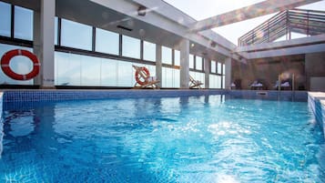 Indoor pool, seasonal outdoor pool, pool umbrellas, sun loungers