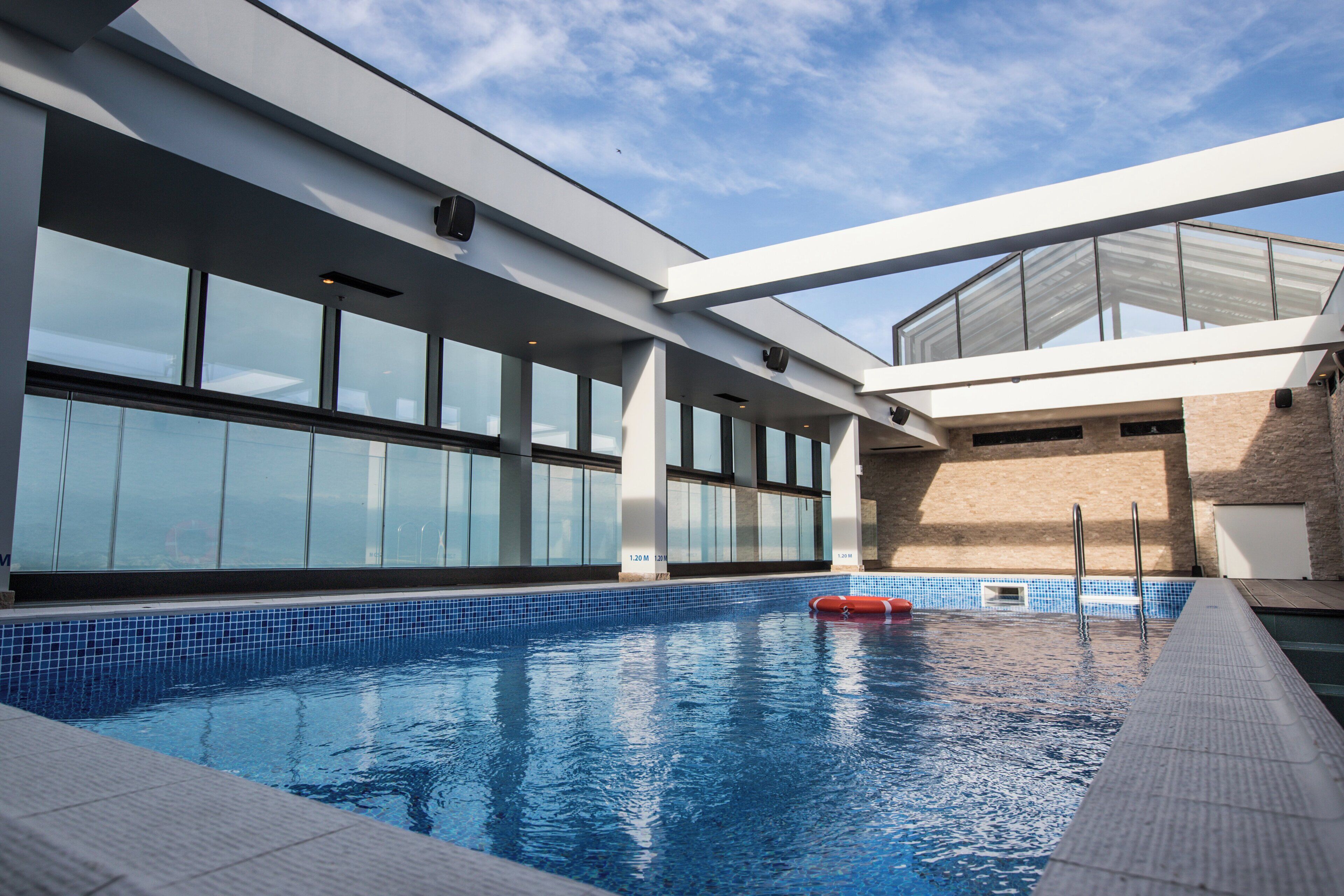 Indoor pool, seasonal outdoor pool, pool umbrellas, pool loungers