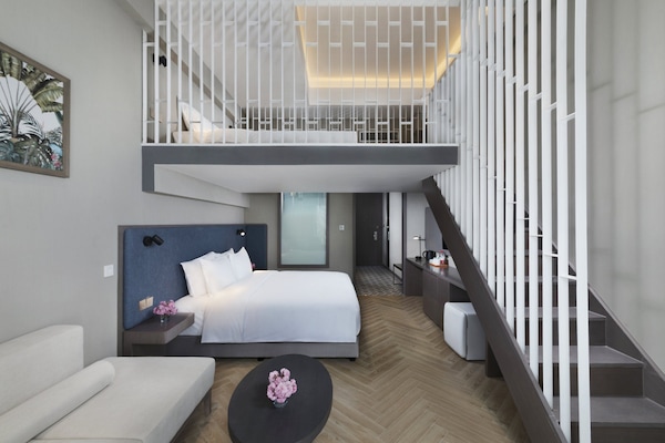 Suite, Multiple Beds, Accessible (Courtyard Access) | Minibar, in-room safe, soundproofing, free WiFi