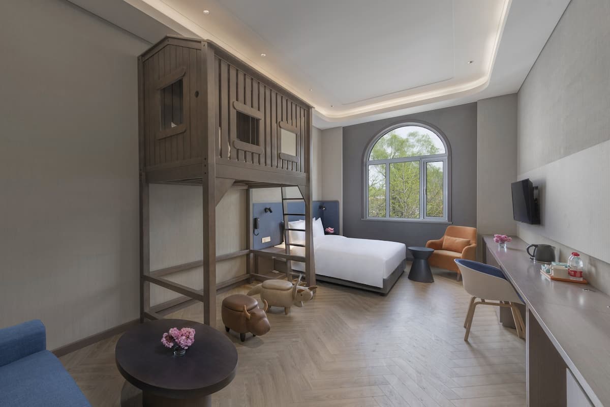 Suite, Multiple Beds (Additional Living) | Minibar, in-room safe, soundproofing, free WiFi