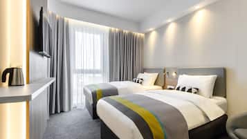 Habitación estándar, 2 camas individuales (Free Breakfast) | Escritorio, cortinas blackout y insonorización