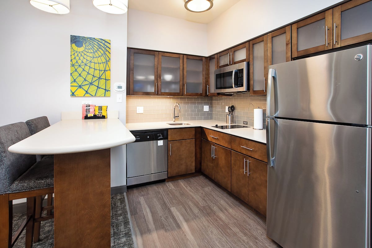 desk, laptop workspace, blackout curtains, iron/ironing board