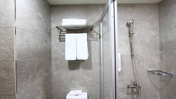 Shower, free toiletries, hair dryer, slippers