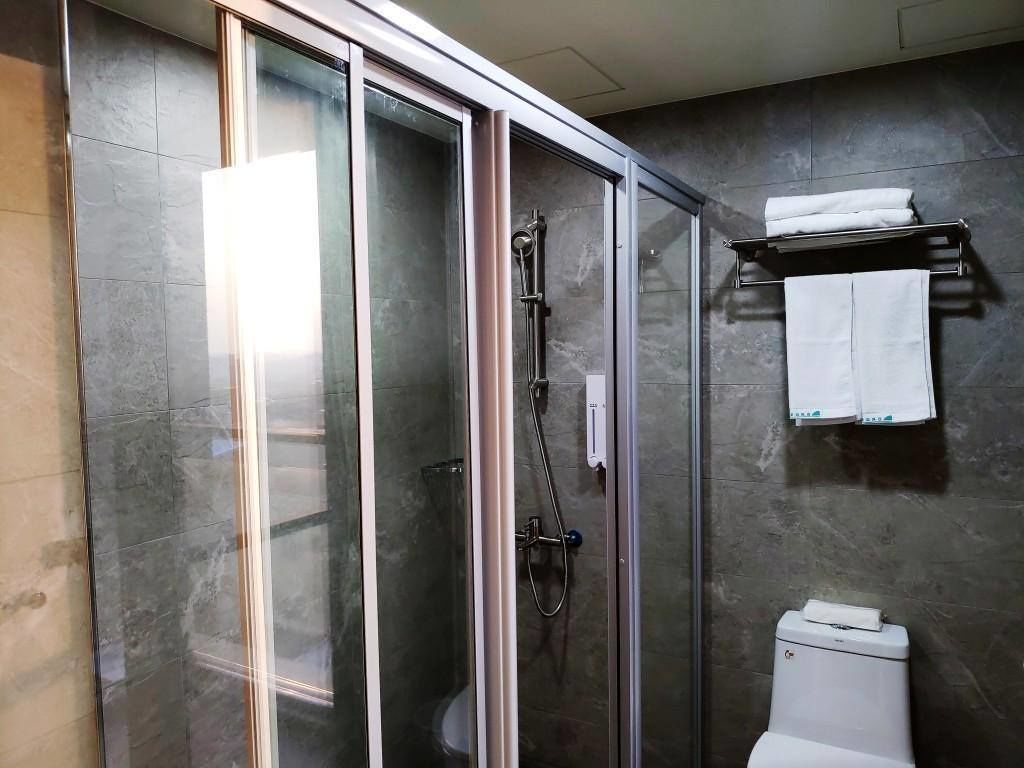 shower, free toiletries, hair dryer, slippers