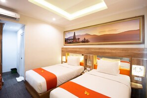 Deluxe Room, Pool View | Minibar, in-room safe, desk, blackout curtains - The Nyaman Bali (Kuta)