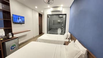 Phòng đôi hoặc 2 giường đơn | Bộ đồ giường cao cấp, nệm cao su hoạt tính (memory foam), minibar