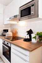 Apartment (C) | Private kitchen | Full-size fridge, microwave, stovetop, coffee/tea maker