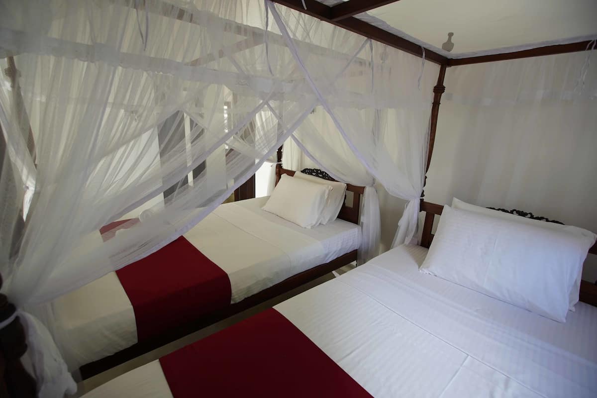 Deluxe Room, 2 Twin Beds | Desk, iron/ironing board (on request), WiFi (free), bed sheets