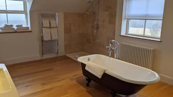 Luxury Suite, Multiple Beds, Garden View | Bathroom | Shower, rainfall showerhead, hair dryer, bathrobes