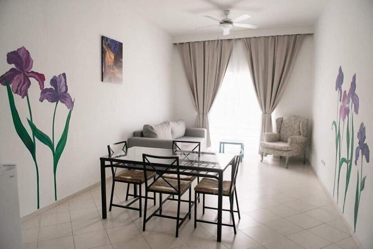Deluxe Room, 1 King Bed with Sofa bed | Living area | 32-inch Smart TV with digital channels, TV