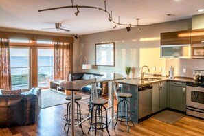 Fridge, microwave, oven, stovetop - Waterfront 3-Bedroom, 2.5-Bathroom Suite at REAL Watersports (Waves)
