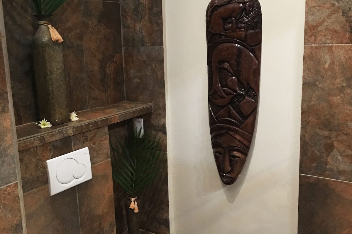 family suite, multiple beds, non smoking, garden view | bathroom | shower, free toiletries, towels, soap